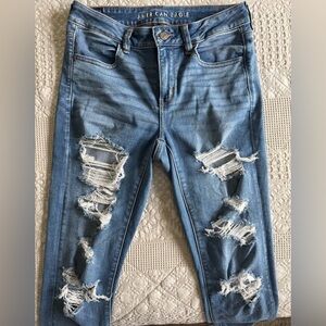 American Eagle Outfitters Light Blue Ripped Jegging (size 8 long)